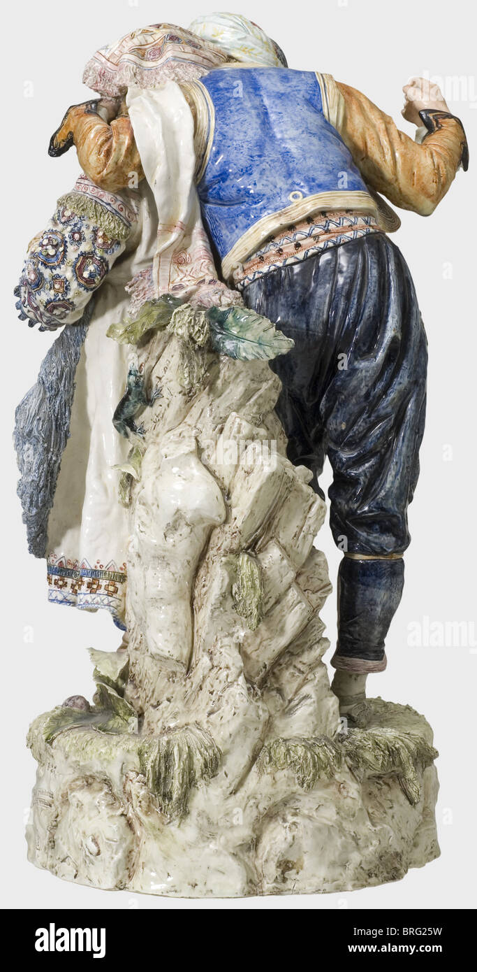 Un viennese di faience figure scultura, Goldscheider(?) azienda, circa nel 1870 un paio in costumi bosniaco appoggiato su di una roccia, modellata in dettaglio in pieno rilievo e verniciato a polvere di colore. L'uomo ha un yataghan e due pistole nella sua cintura, la donna è in possesso di un flauto. Decorate con motivi floreali, alto zoccolo, numerate '627' e '8' sul retro e recanti la scritta (transl.), 'protetto dalla legge, copie riservate". Fatta eccezione per un piccolo chip o restauro rispettivamente sul bordo inferiore dello zoccolo, in perfette condizioni, presumibilmente, l'uomo ha inizialmente mantenuto una lancia o così, artista del diritto d'autore non deve essere cancellata Foto Stock