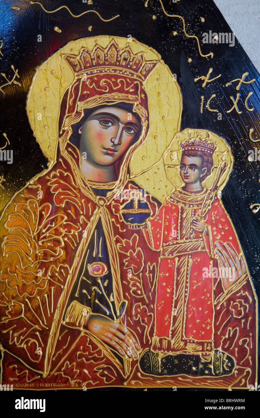 Vergine Maria e il Bambino Gesù Cristo una decorazione sulla chiesa in pietra Krete Creta isola Grecia black rock Foto Stock