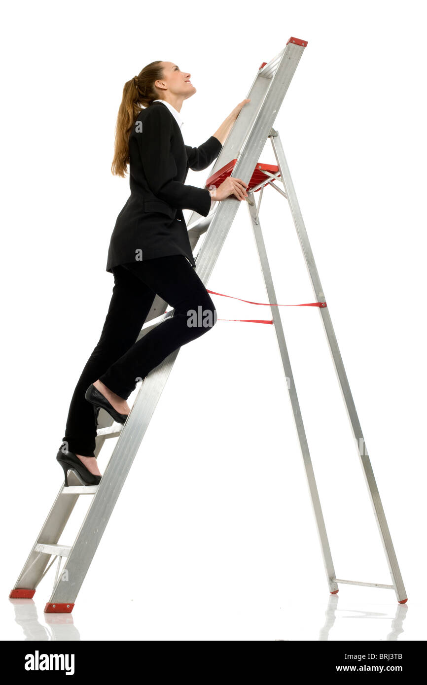 Giovane imprenditrice su una scala Foto Stock