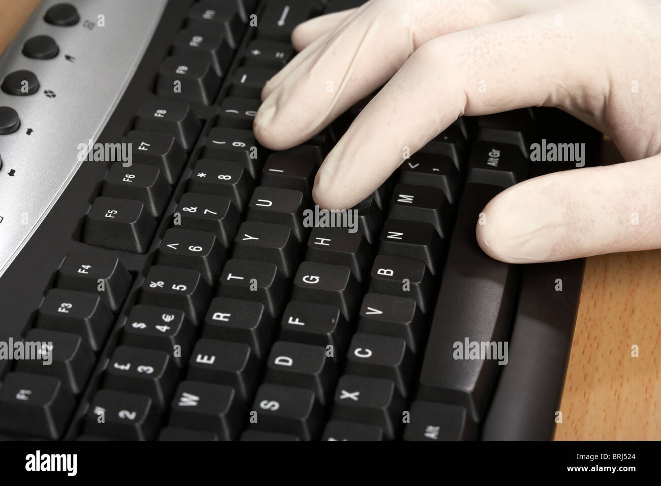 Hacker computer gloves keyboard immagini e fotografie stock ad alta  risoluzione - Alamy