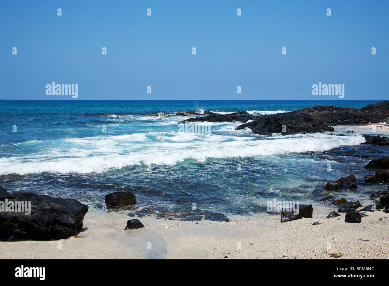 Vista costiera sulla Big Island delle Hawaii con rocce laviche Foto Stock