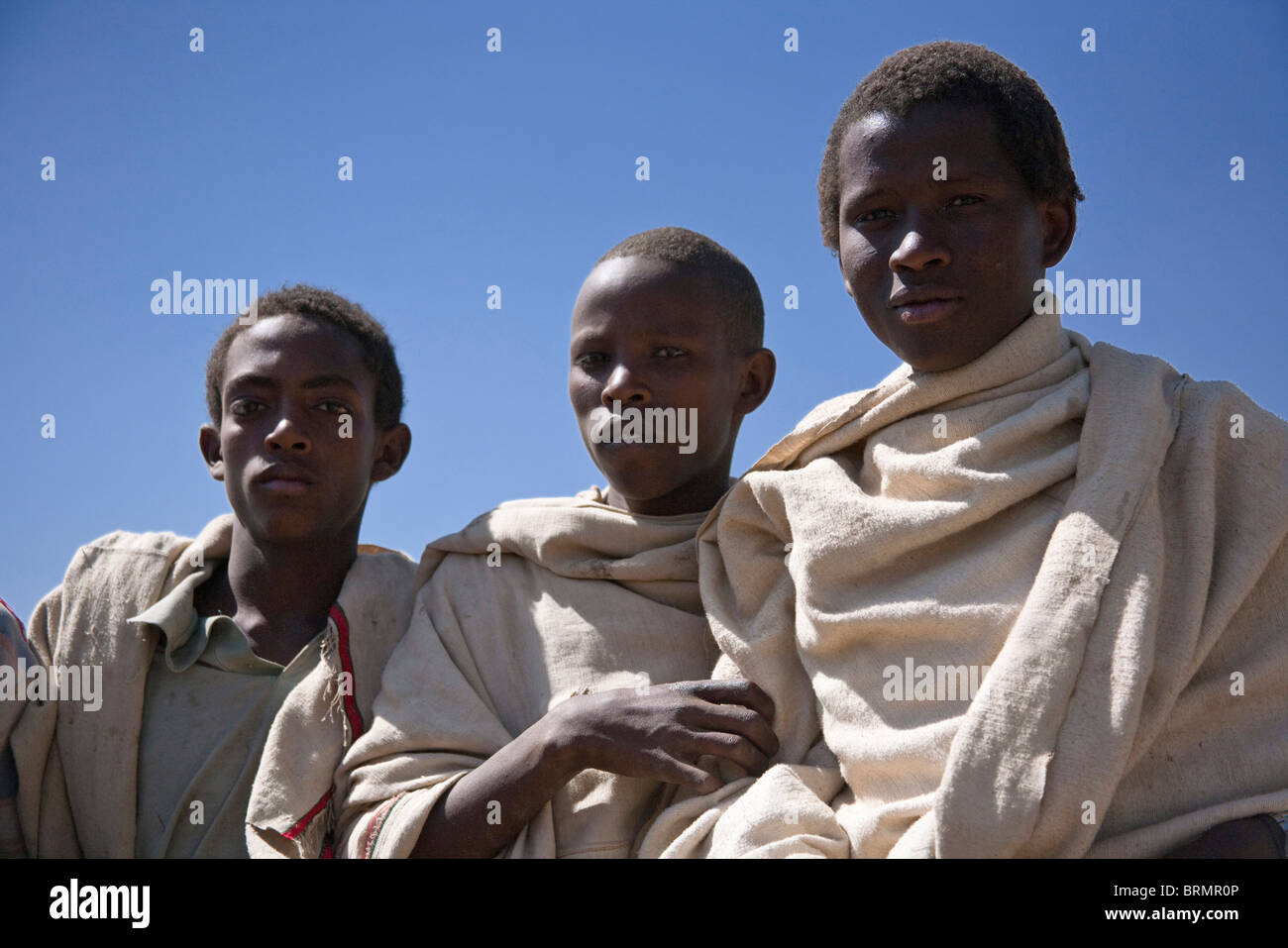 Ritratto di tre allevatori di cammelli in abito tradizionale Foto Stock