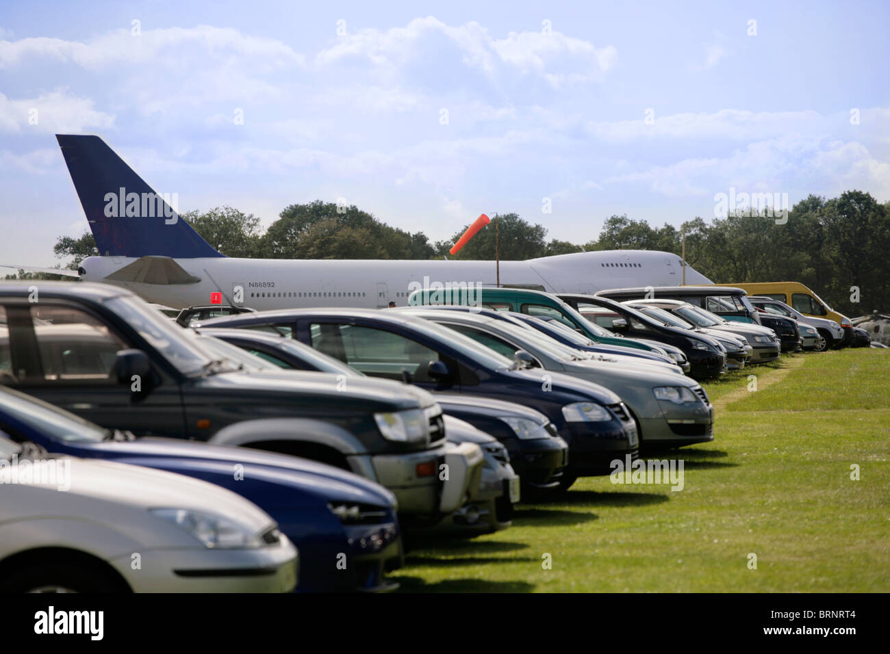 In aereo il parco auto vetture passeggeri fila jet funny Foto Stock