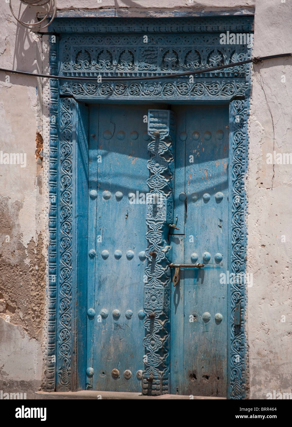 Stonetown ornati scolpiti porta in legno Foto Stock