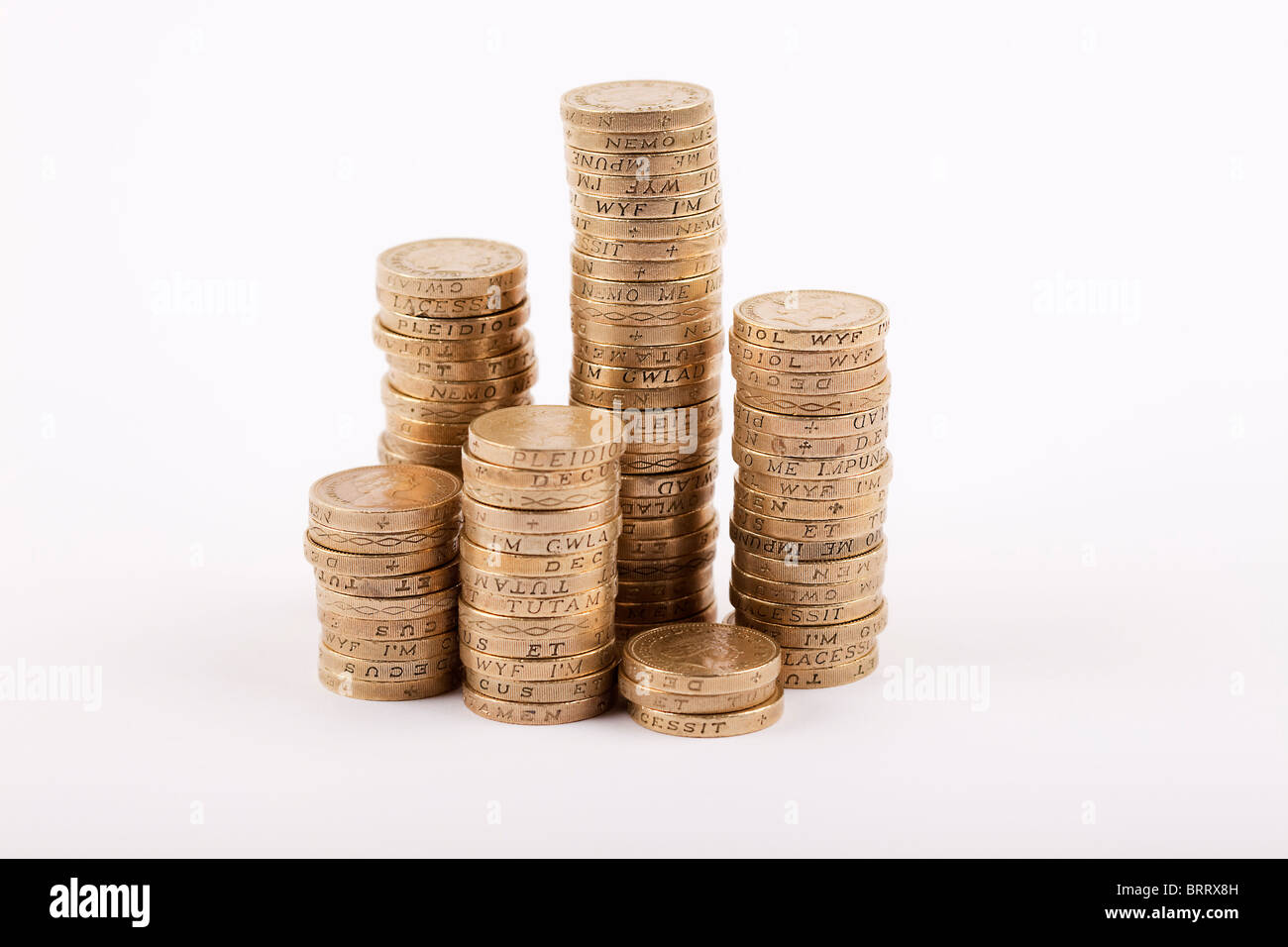 Una pila di inglese una libbra di monete Foto Stock