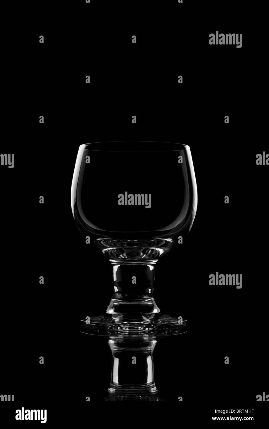 Bicchiere da vino e illuminazione di RIM Foto Stock