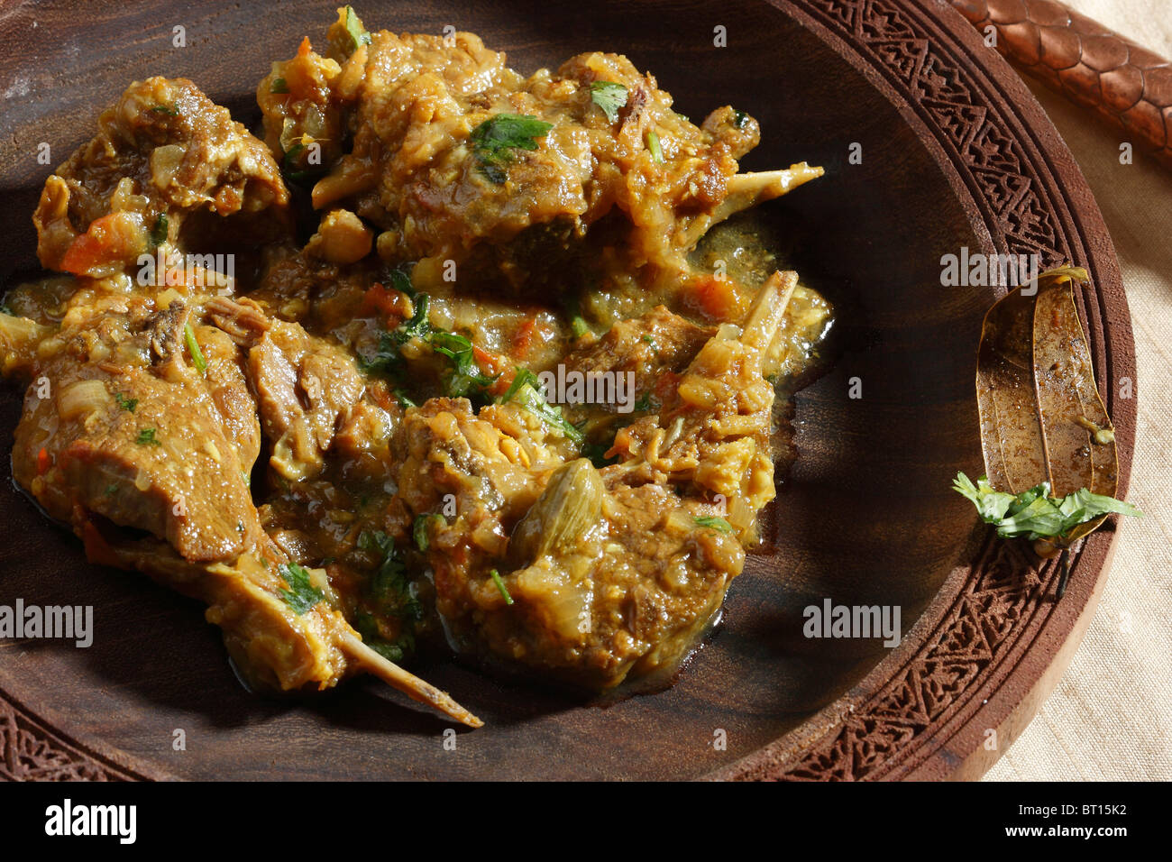 Teewarn preparati a partire da carni di montone cotto con pomodori, cipolle, zenzero, aglio peperoncini verdi e fresche spezie indiane. Foto Stock