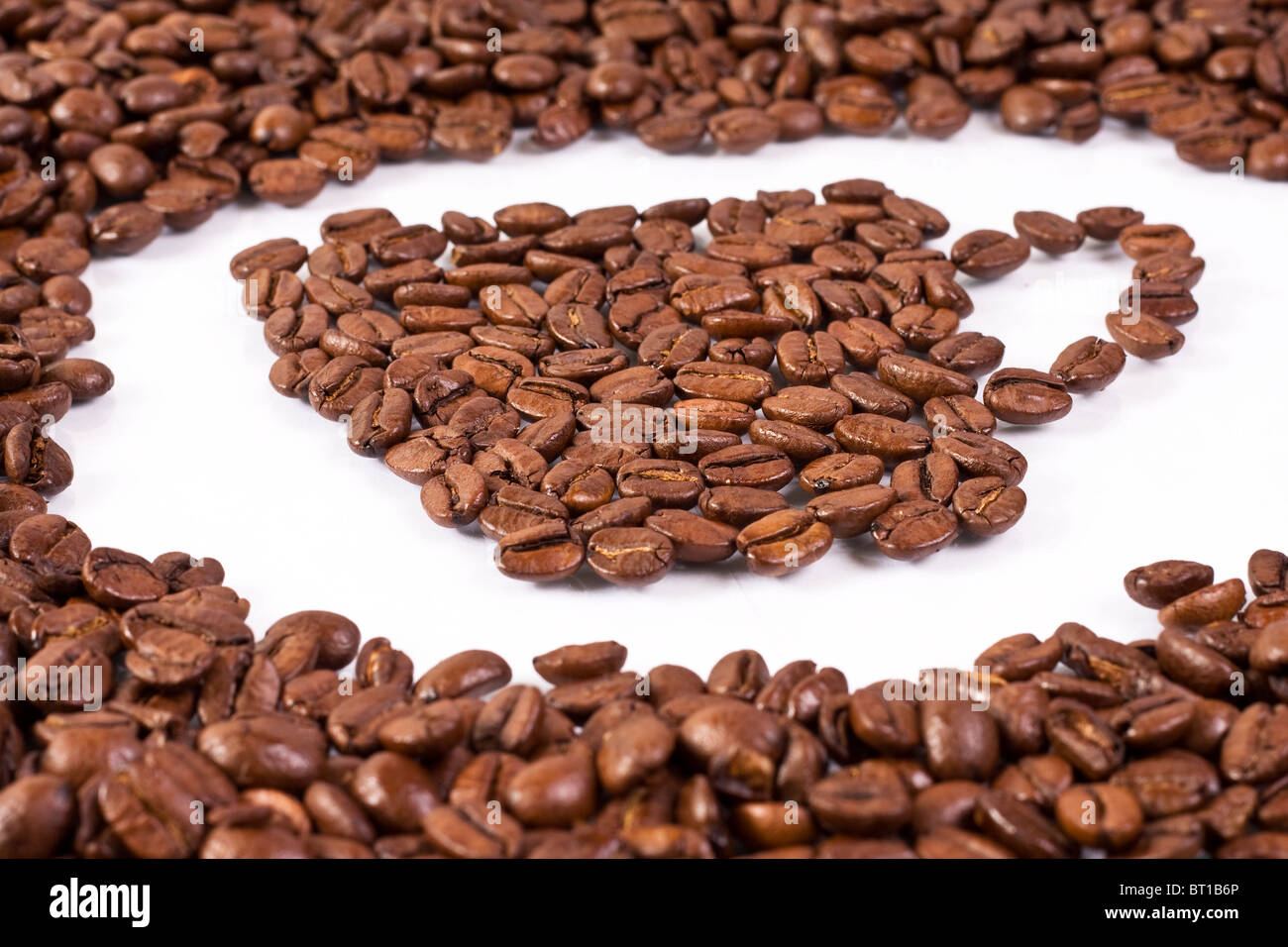 Tazza di caffè in chicchi di caffè Foto Stock