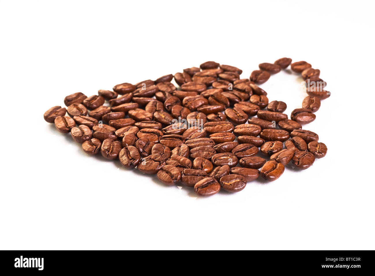 Tazza di caffè in chicchi di caffè. Profondità di campo. Foto Stock