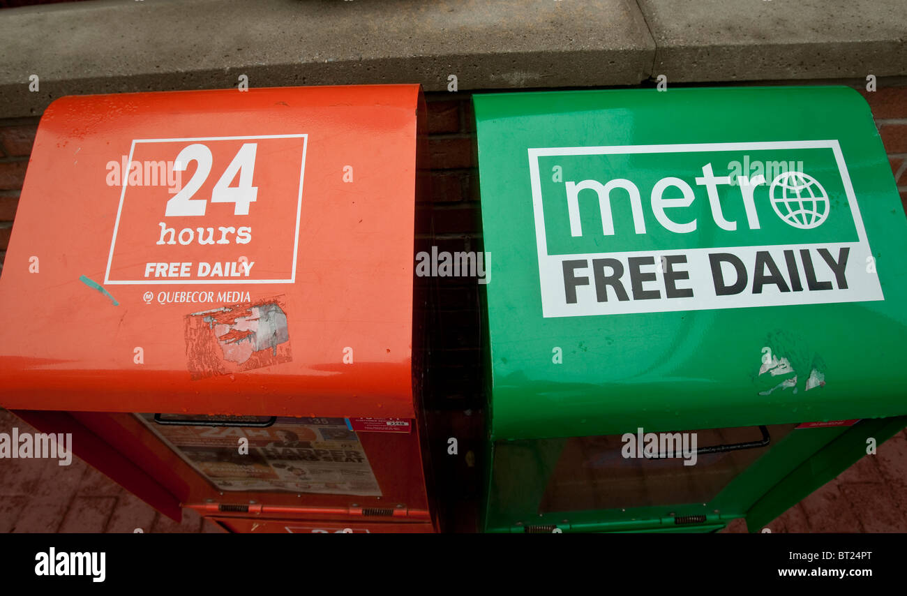 24 ore gratuito e quotidiano gratuito Metro quotidiani scatole seduti fianco a fianco in Ottawa domenica 26 settembre, 2010. Foto Stock