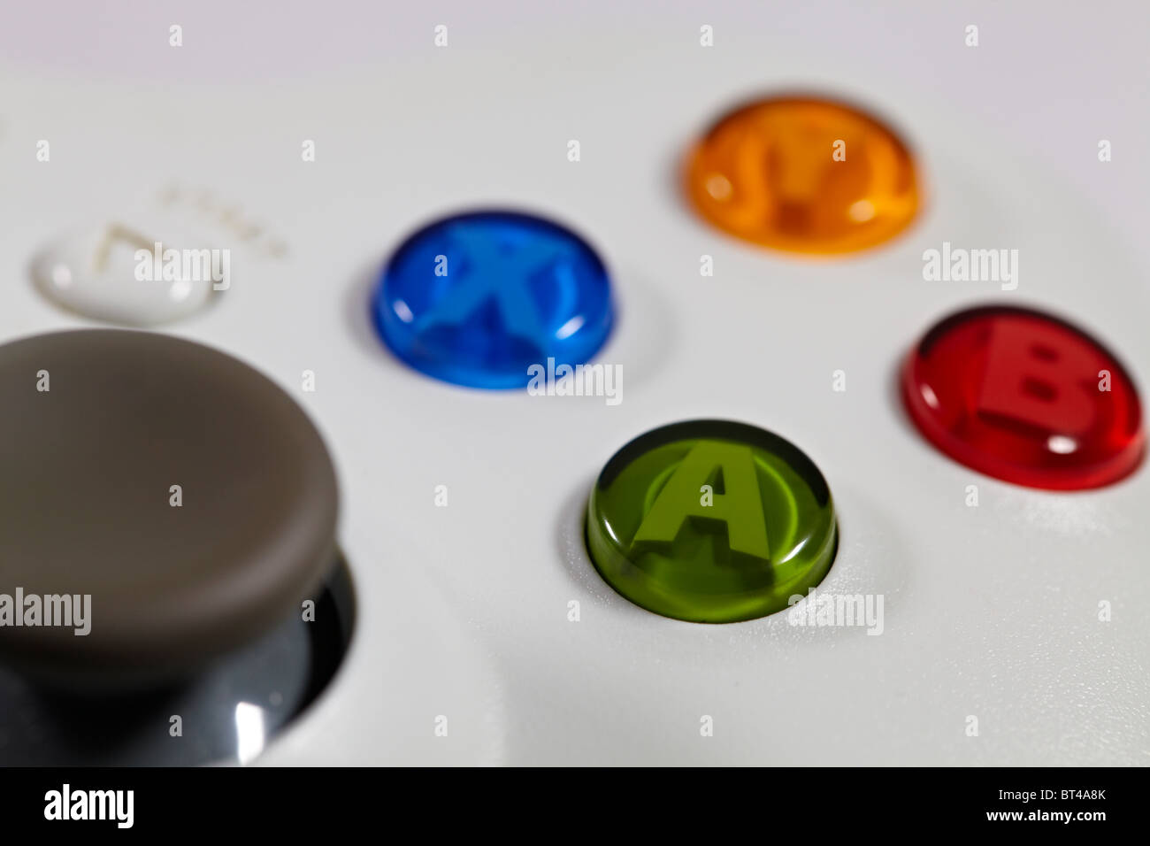 Ripresa macro di un controller Xbox 360 che mostra ciascuna delle quattro pulsanti (A, X, Y, B) Foto Stock