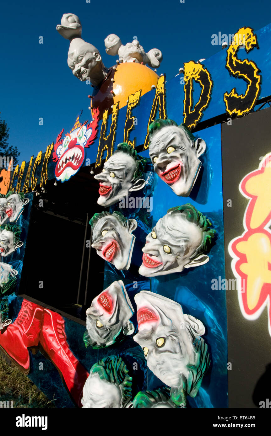 2010 Glastonbury Festival of Contemporary Performing Arts Festival teste testa joker famosa maschera bordo rosso i capelli verdi le caratte commedia Foto Stock