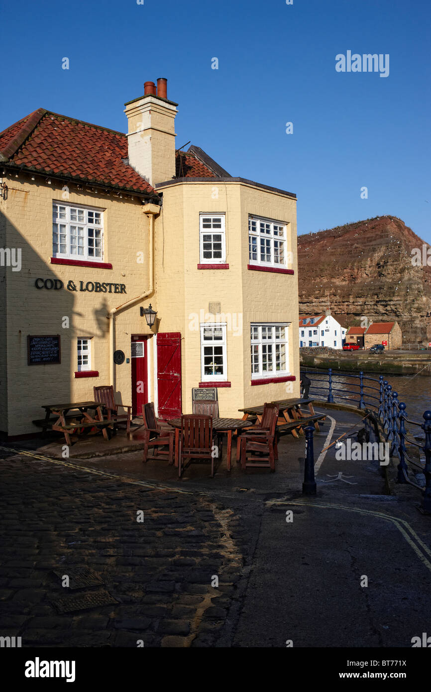 Cod & Lobster pub, Staithes, North Yorkshire. Inverno Foto Stock