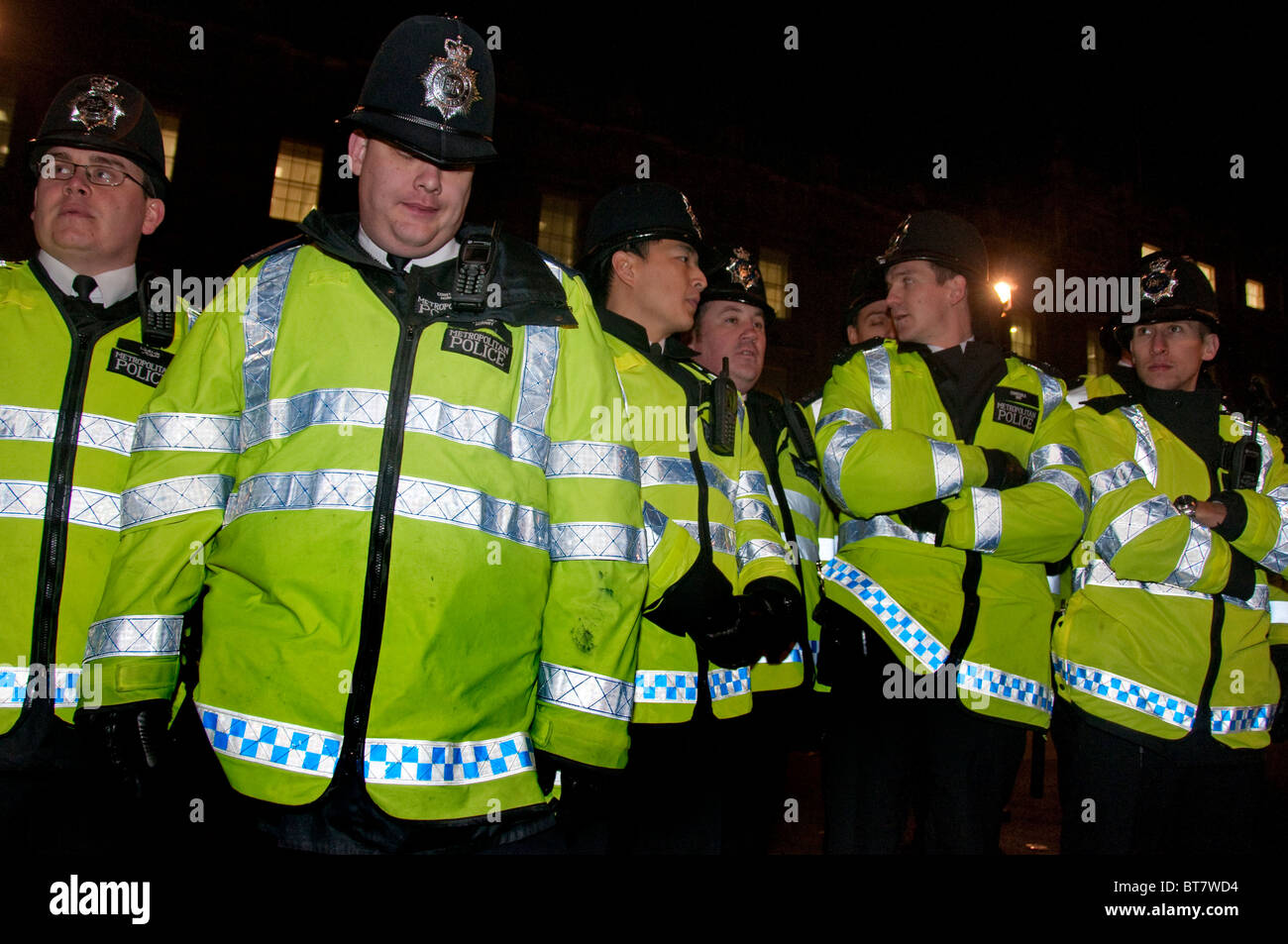 Il gruppo di funzionari di polizia ad una manifestazione a Londra Foto Stock