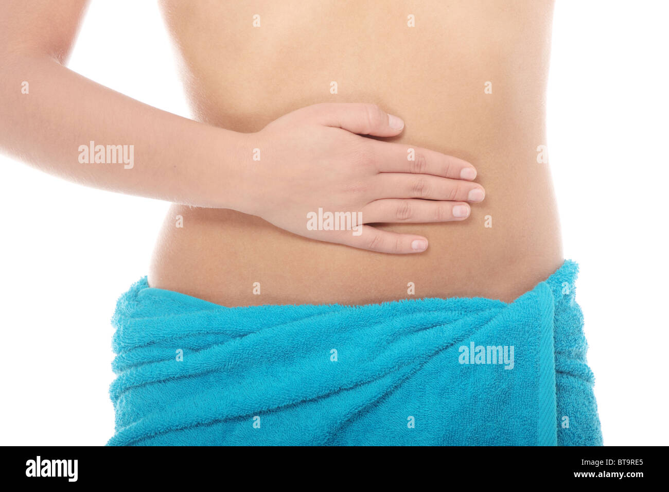 Mano sul ventre isolati su sfondo bianco Foto Stock
