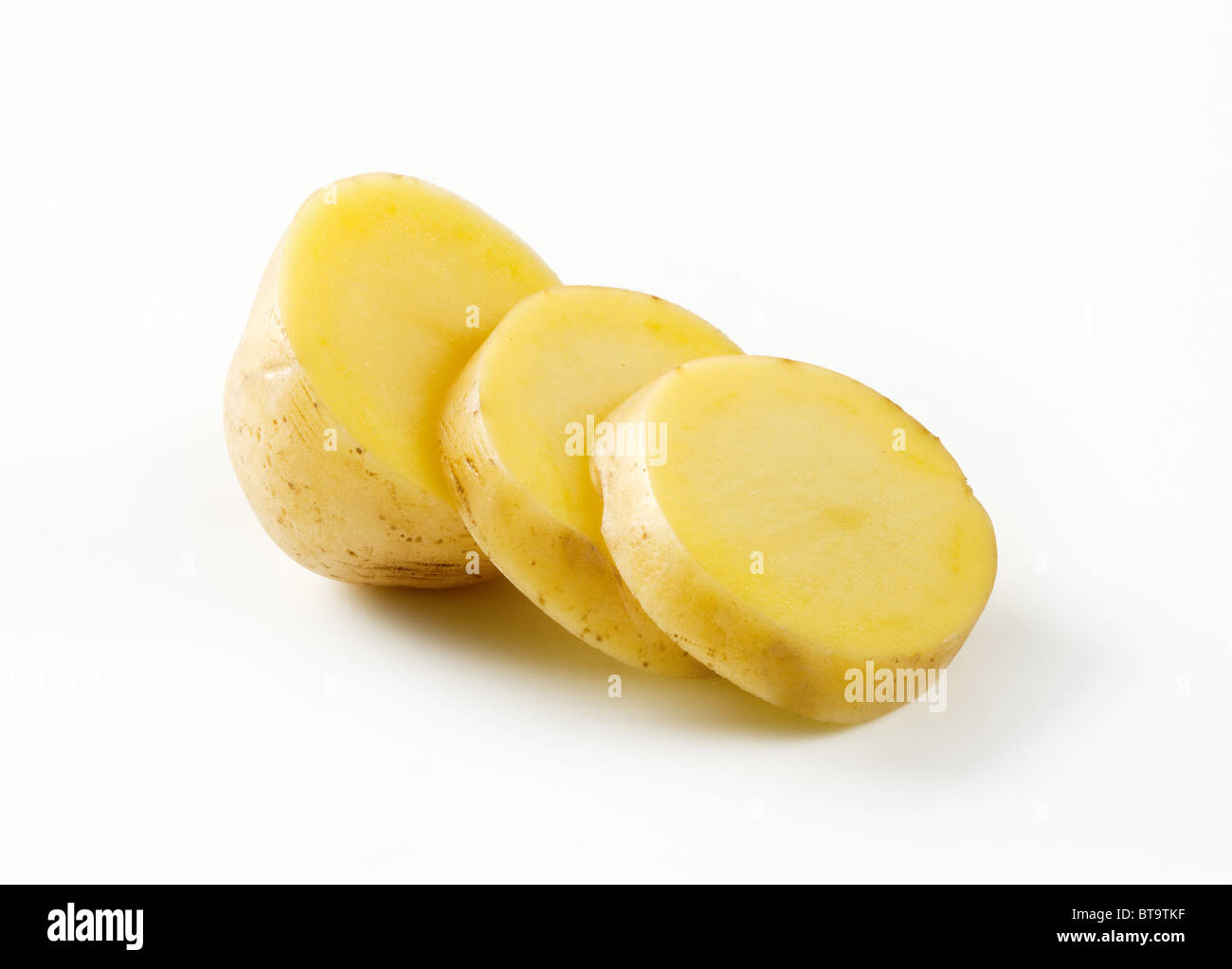 Fette di patate fresche Foto Stock