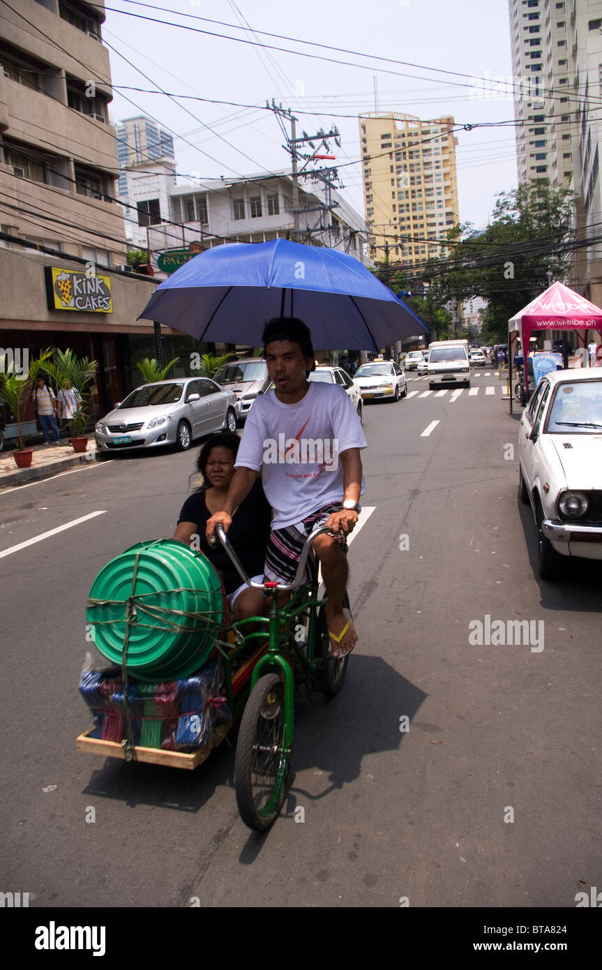 Streetscene del malato, un quartiere di Manila, la città capitale di phlippines Foto Stock
