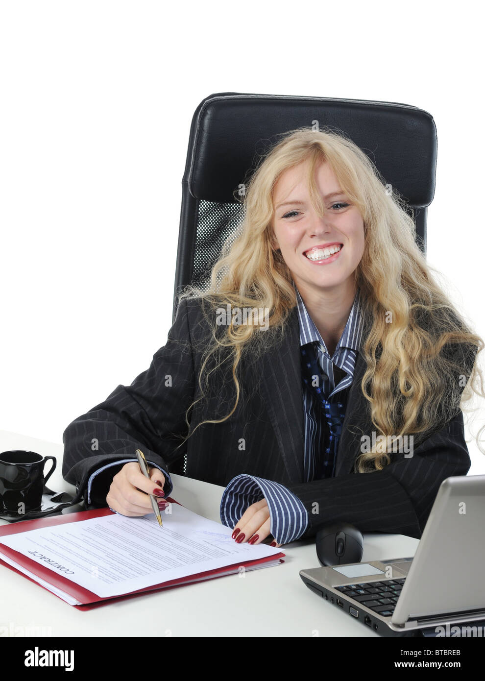 Donna in ufficio con computer Foto Stock