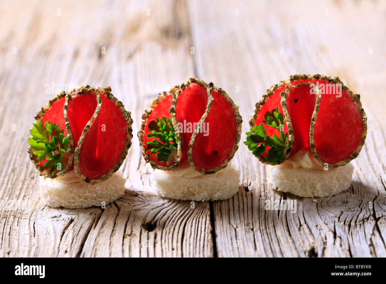Tartine di salame Foto Stock