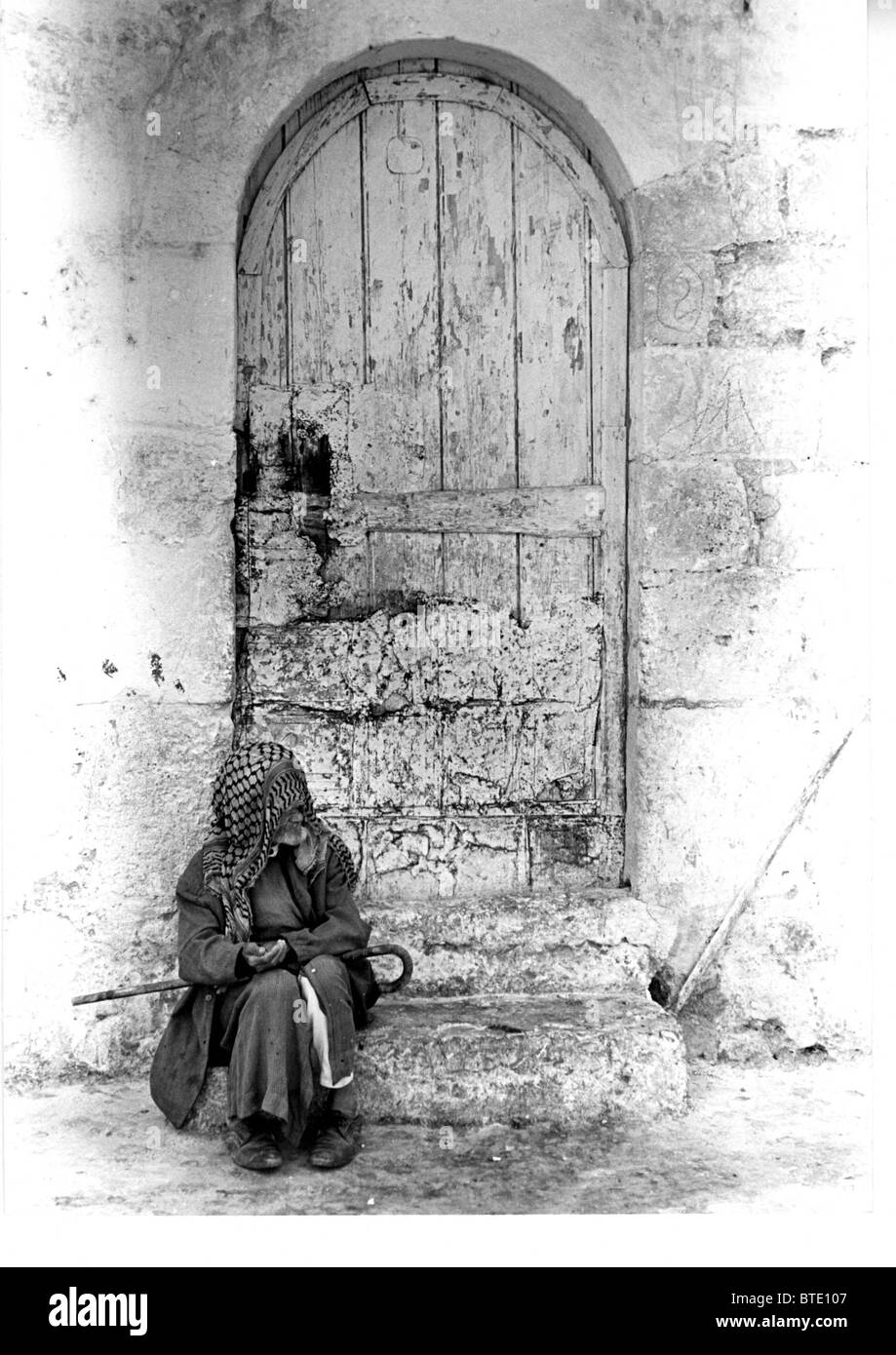 5454. Un begger nella Città Vecchia di Gerusalemme Foto Stock