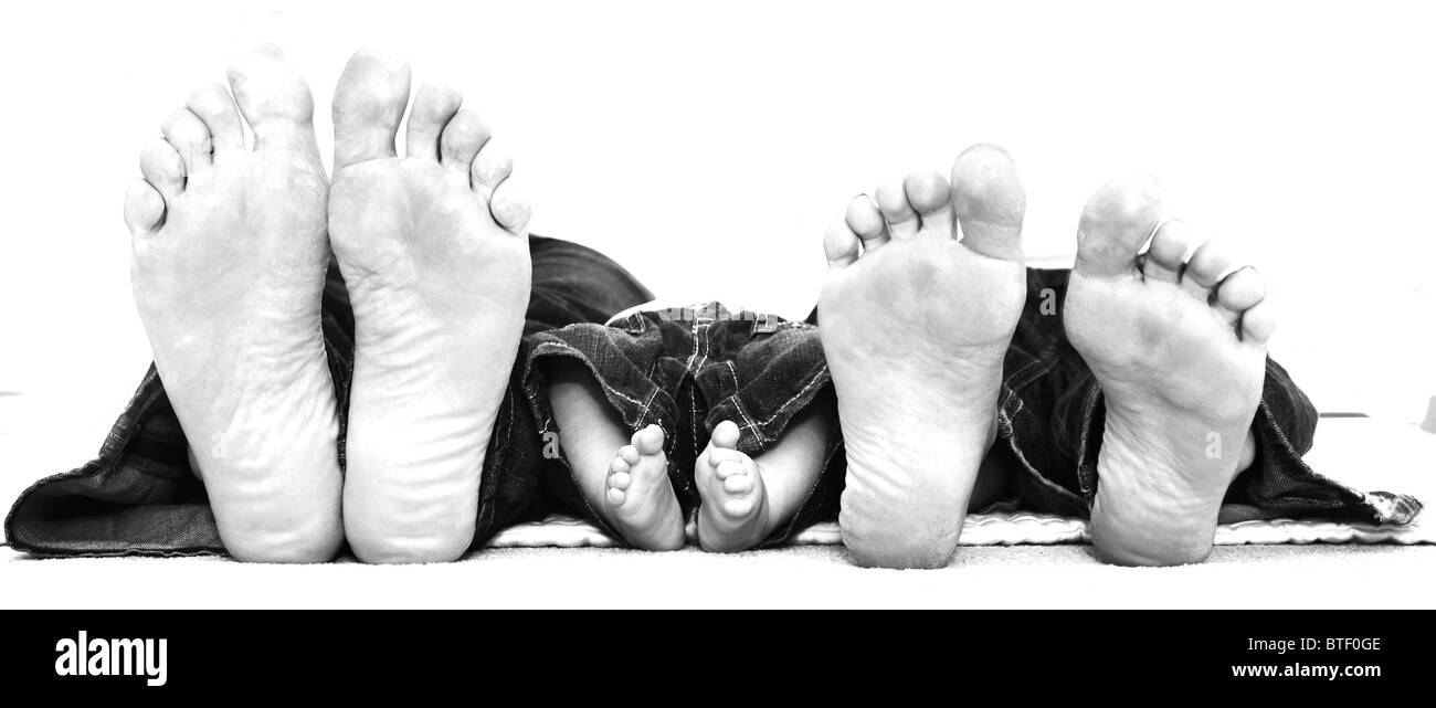 Piedi della famiglia Foto Stock
