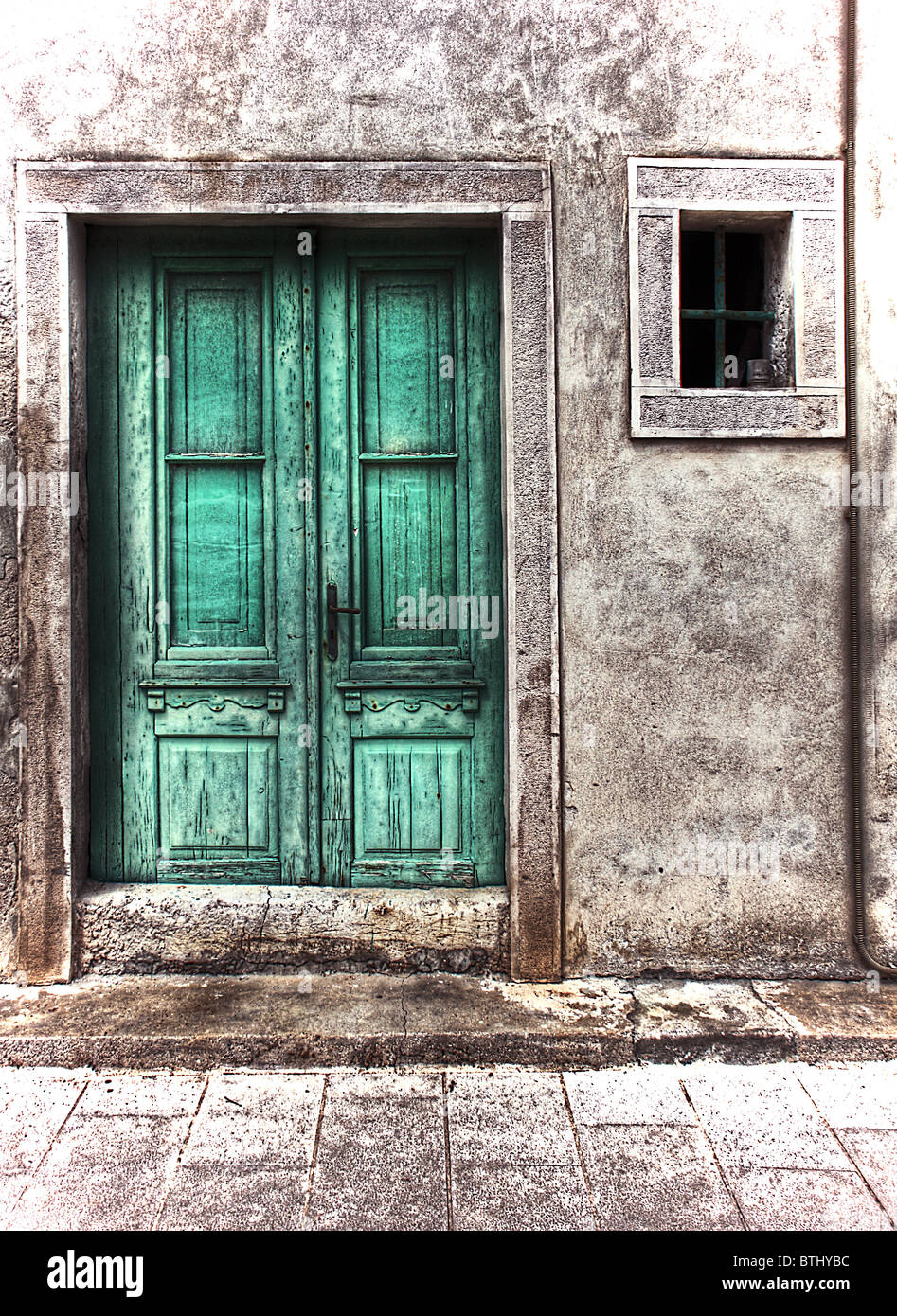 La vecchia porta verde Foto Stock