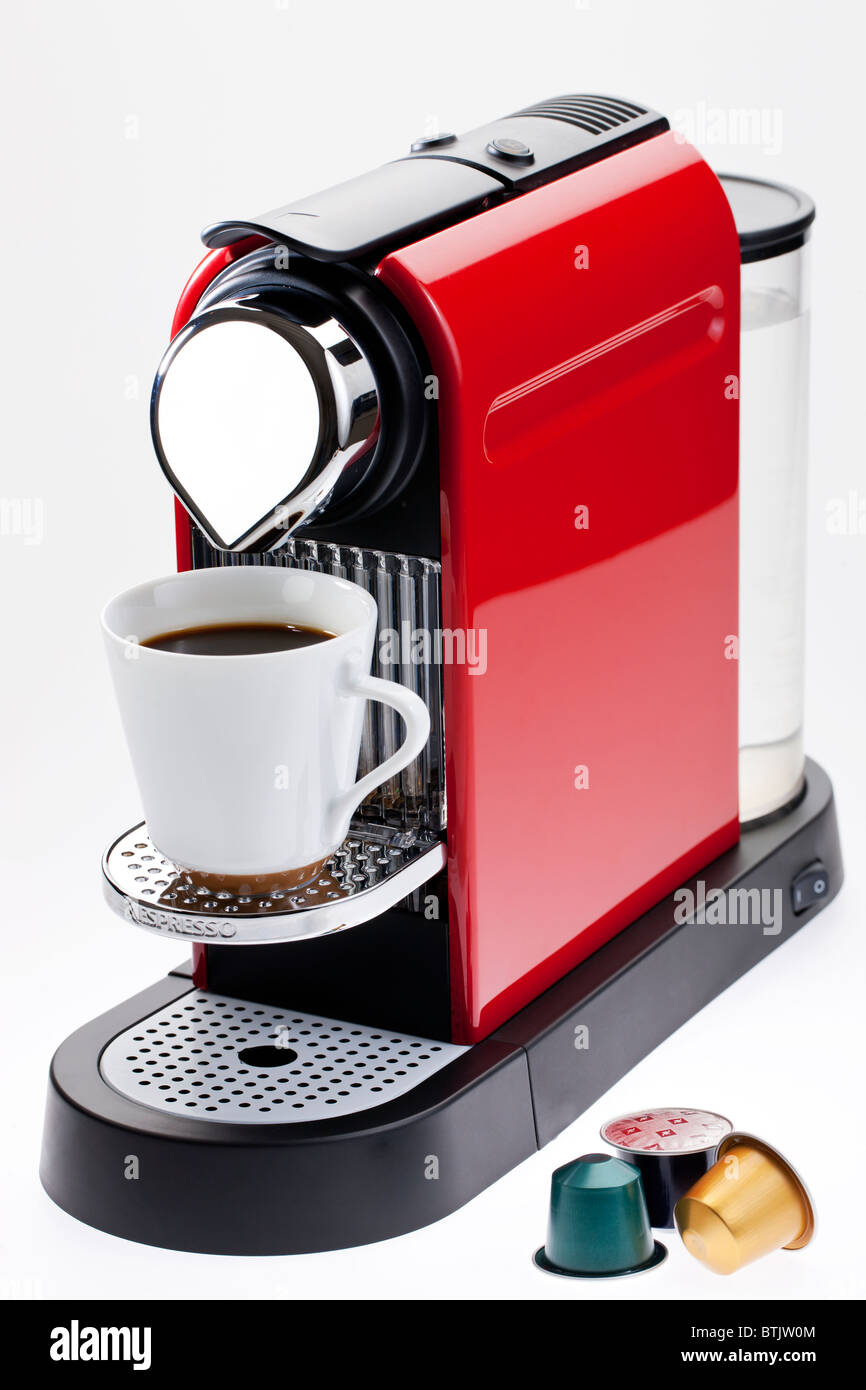 Red automatico di macchina per il caffè e le capsule di caffè Foto Stock