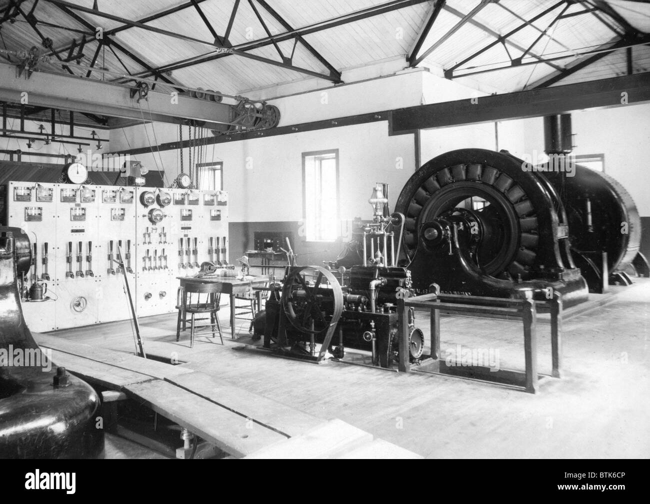 Elettricità. Westinghouse generatore AC. Al momento del completamento (1898), ha generato potenza AC trifase ad una pressione di 40.000 volt, la massima tensione di qualsiasi attività commerciale sistema di potenza elettrica in tutto il mondo. Telluride Power Company, Nunn Centrale Idroelettrica, Utah, 1898 Foto Stock