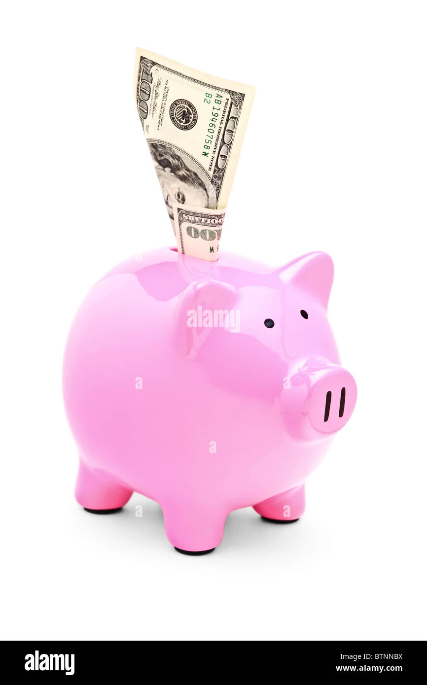 Una vista di un rosa salvadanaio e 100 US dollar in esso Foto Stock