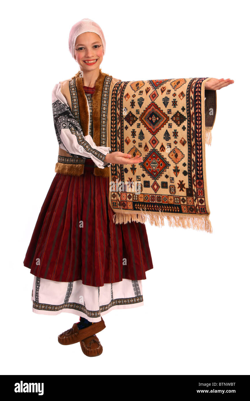 Giovane ballerino in rumeno rug venditore nazionale di danza, costume isolato su sfondo bianco Foto Stock