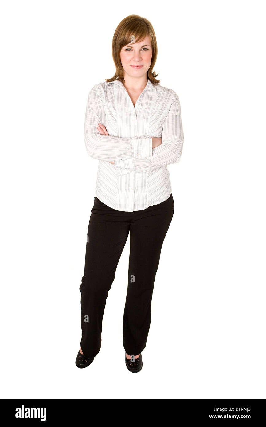 Una giovane donna professionale con le braccia incrociate isolato su bianco Foto Stock