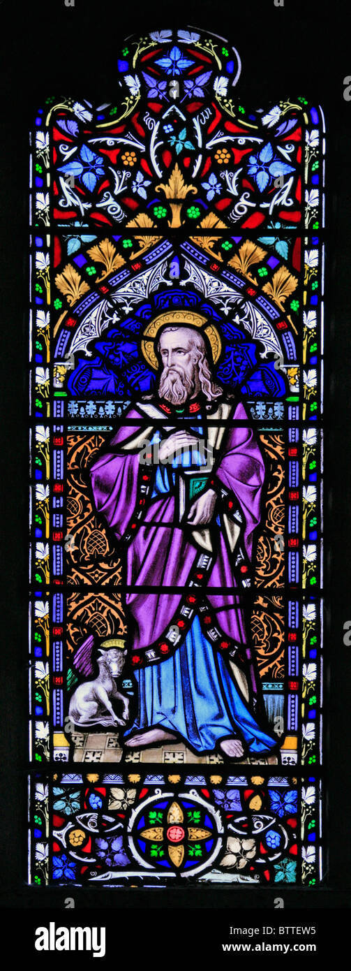 Una delle vetrate colorate raffiguranti San Luca Evangelista, Chiesa Parrocchiale di San Giacomo il Grande, Bratton, Wiltshire Foto Stock