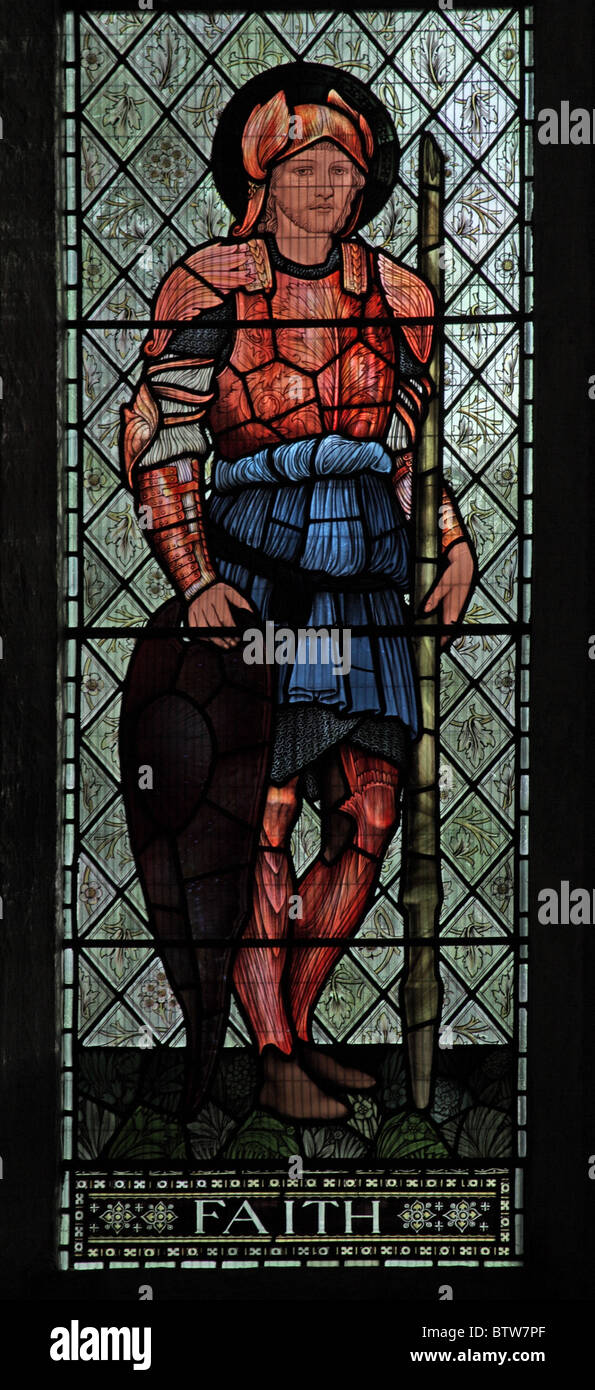 Una finestra di vetro colorato da Edward Burne-Jones raffiguranti la Fede, Malmesbury Abbey, Wiltshire Foto Stock