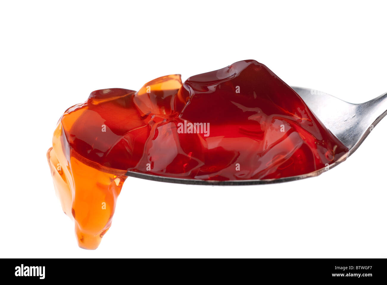 Cucchiaio da tavola di fragola rossa jelly Foto Stock