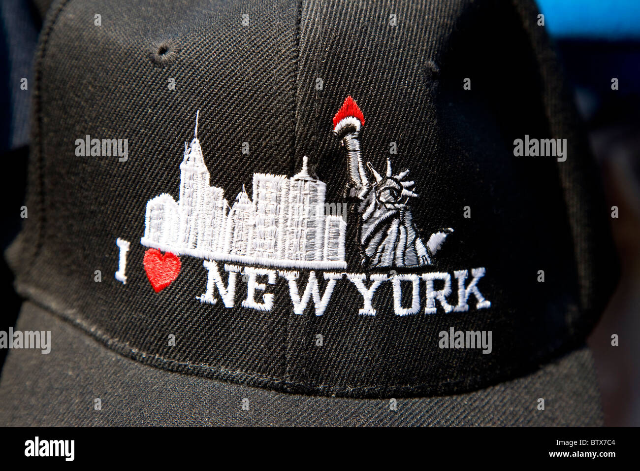Io amo New York i cappelli da baseball in Battery Park Foto Stock