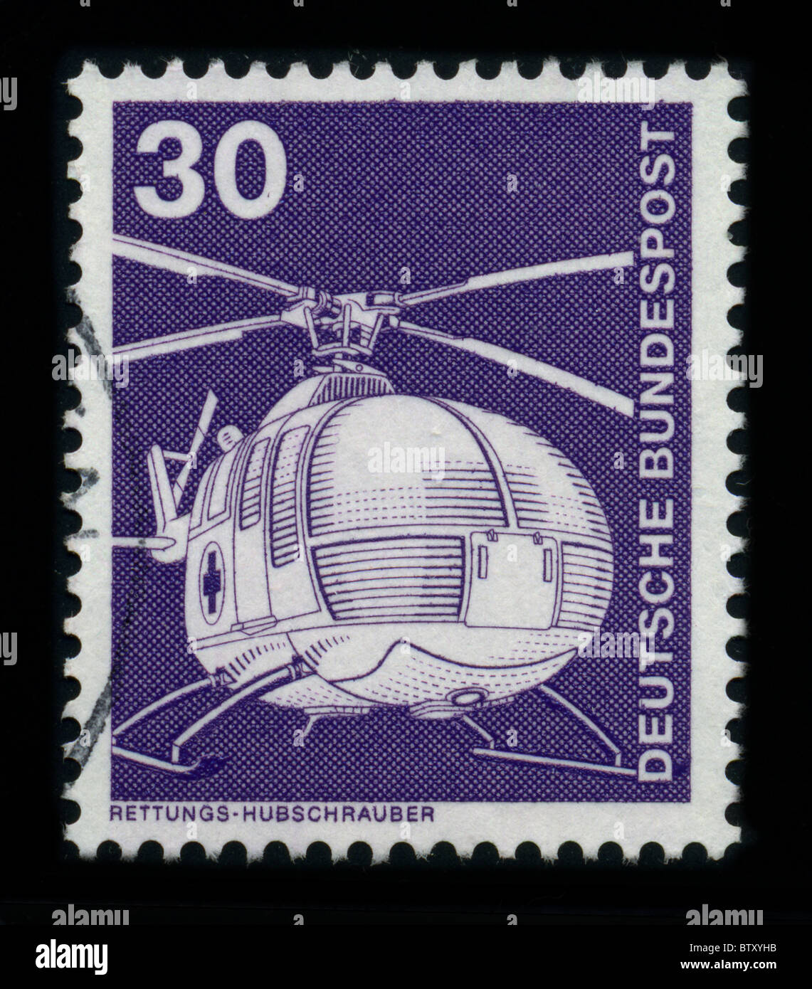 Germania - circa 1980: un timbro mostra immagine della dedicata all'elicottero è un tipo di rotorcraft in cui spinta e sollevamento sono forniti da uno o più motori rotori azionati, circa 1980. Foto Stock