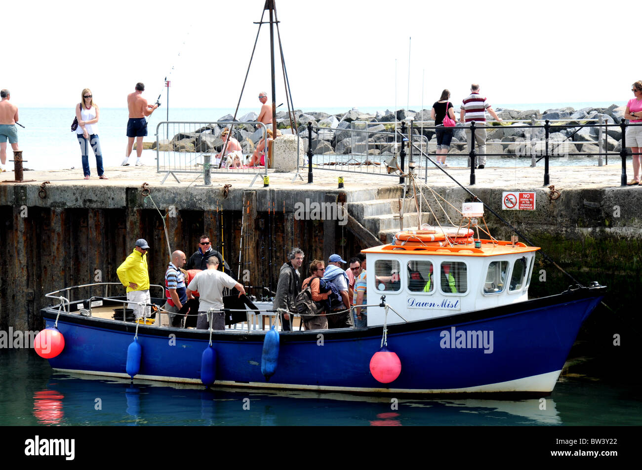 Viaggio di pesca tornando a Lyme Regis Foto Stock