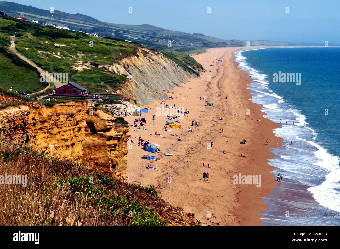 Il Dorset burton bradstock spiaggia verso portland in una bella giornata di sole Foto Stock