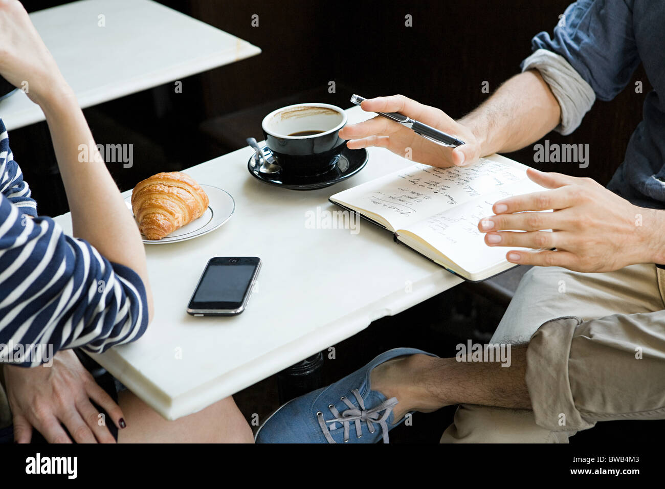 Riuniti in un caffè Foto Stock