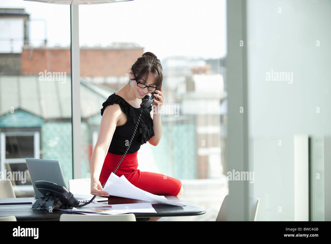 Imprenditrice sul telefono Foto Stock