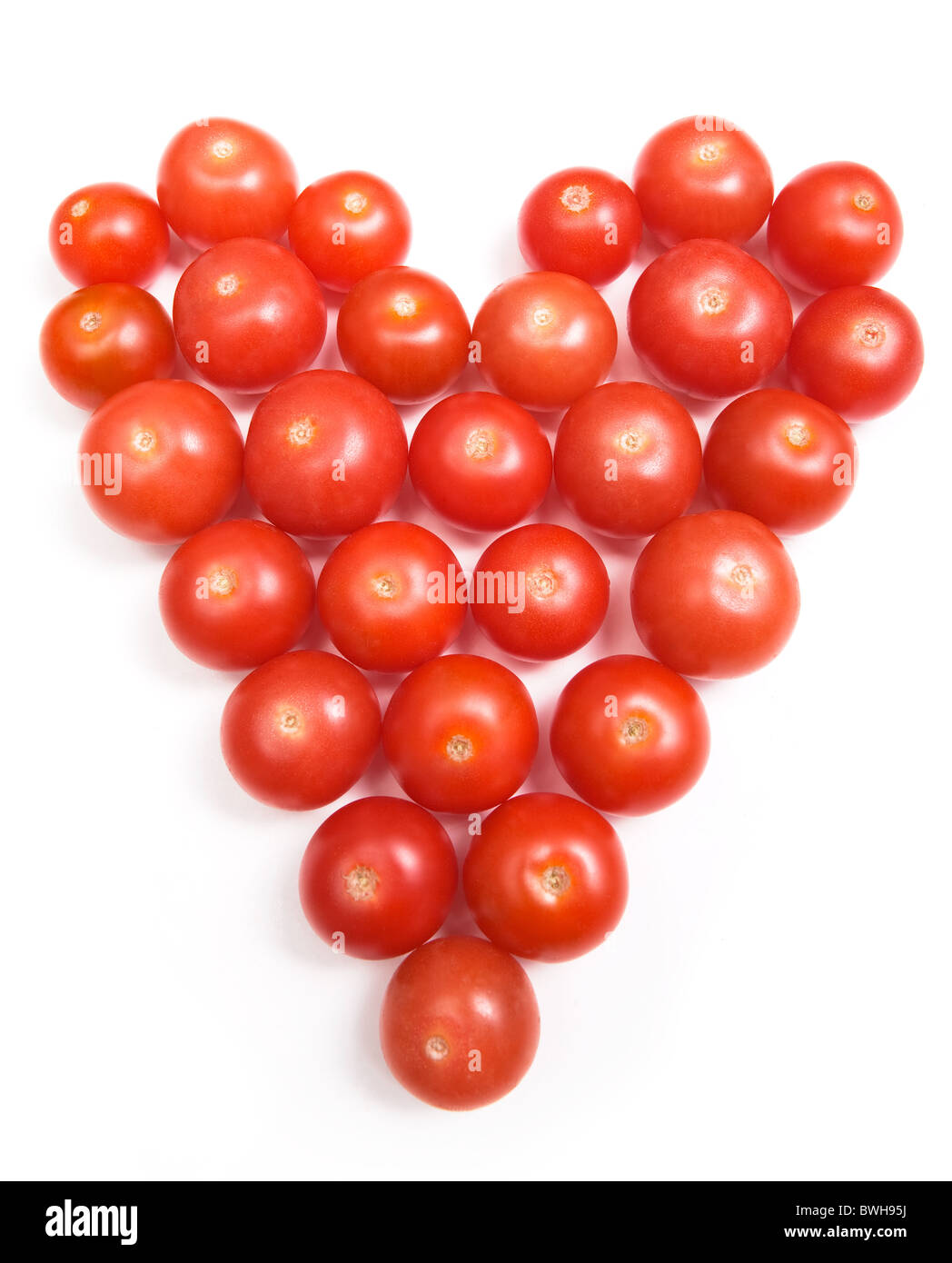 Pomodori formata in forma di cuore - una dieta sana Foto Stock