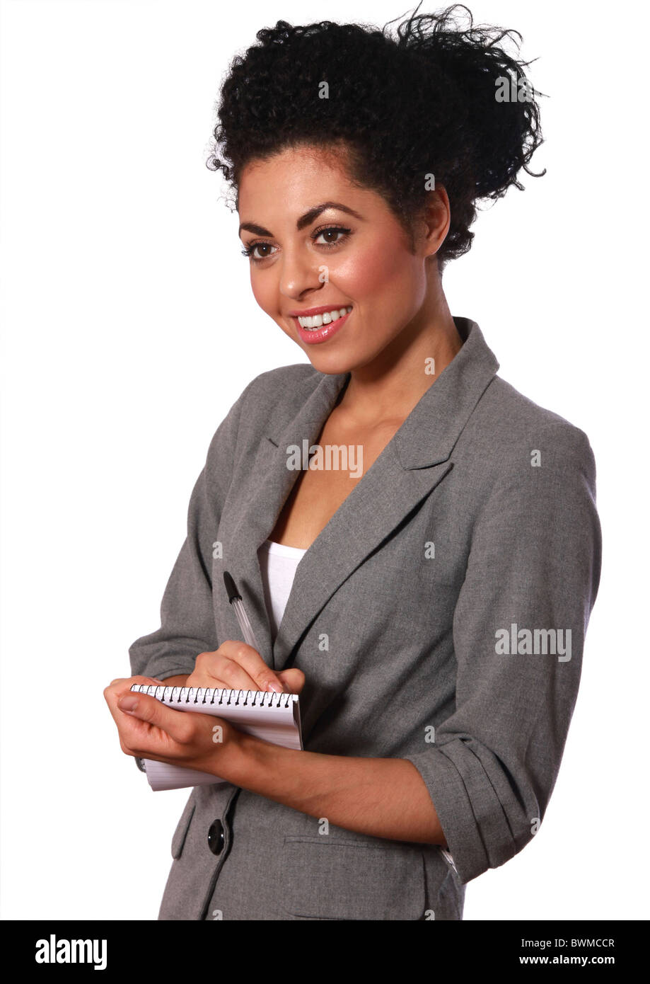 Giovani, mixed-gara, business donna prendendo appunti Foto Stock