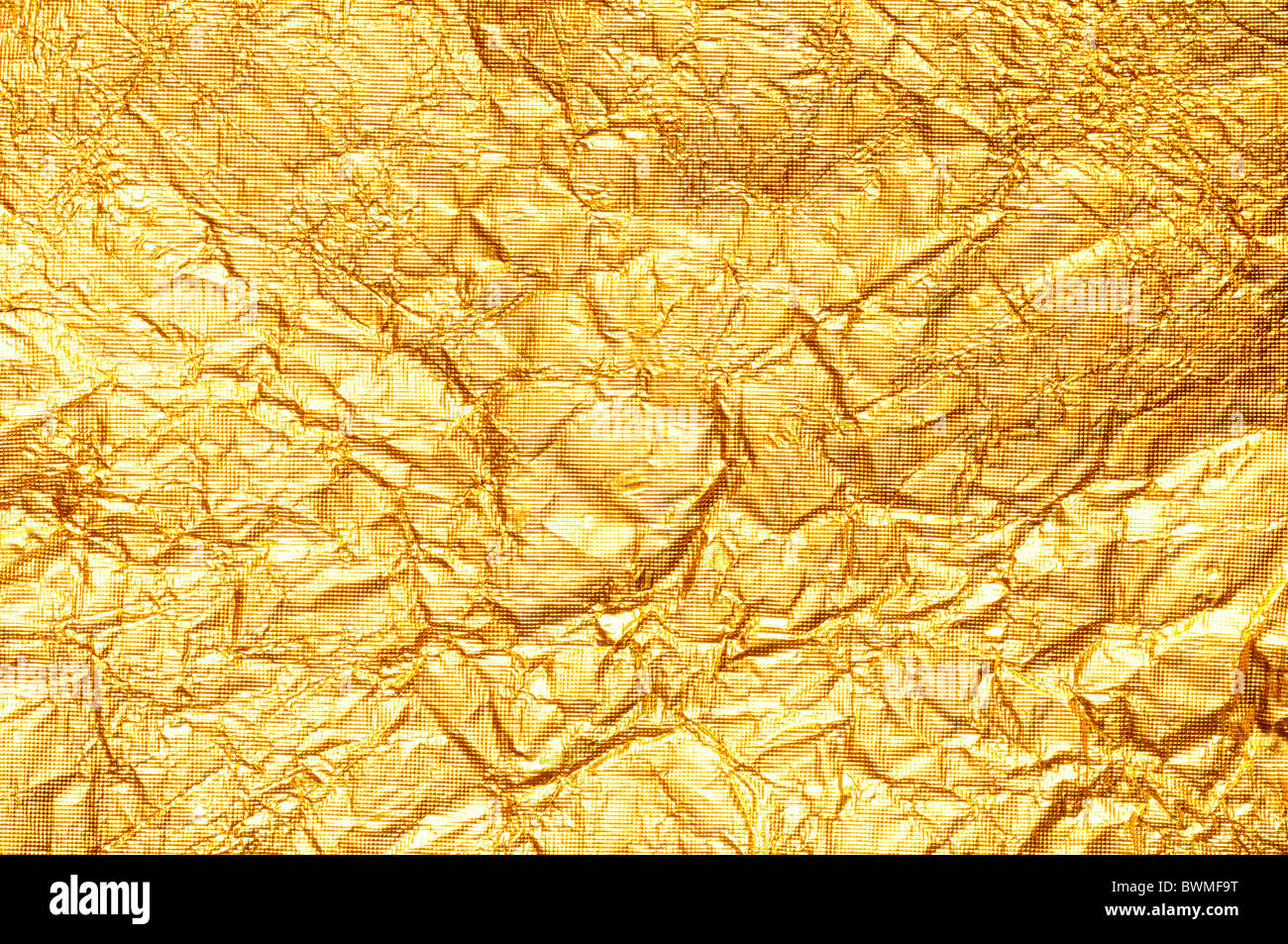 Crumpled di lamina di oro a trama orizzontale di sfondo Foto Stock