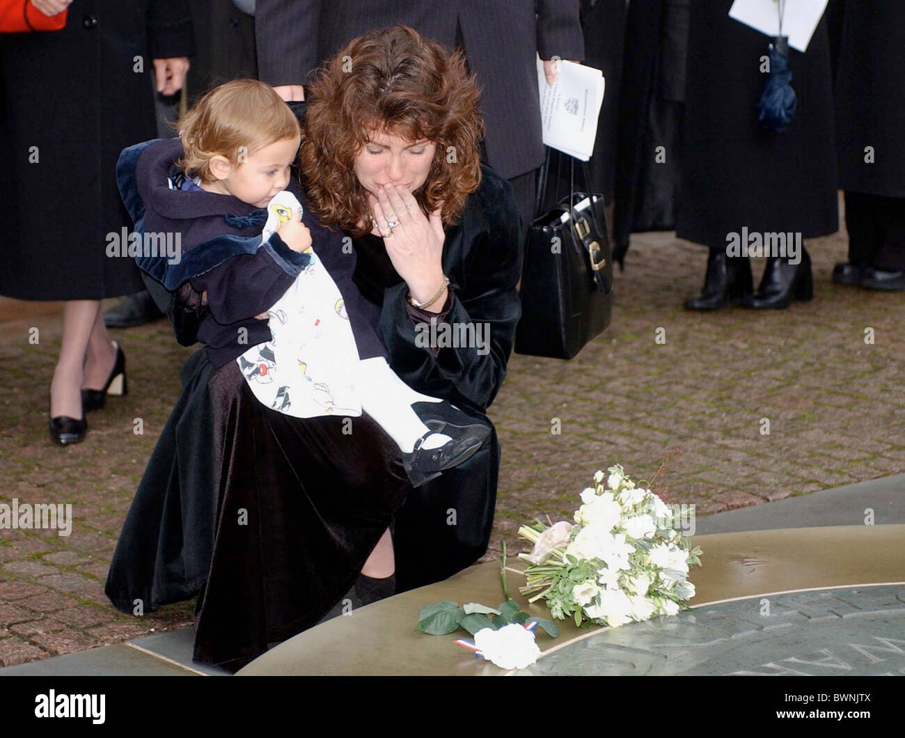 MOURNER IN SERVIZIO PRESSO L'abbazia di Westminster a Londra per il BRITISH VITTIME DEL 9/11 WORLD TRADE CENTER TRAGEDIA Foto Stock