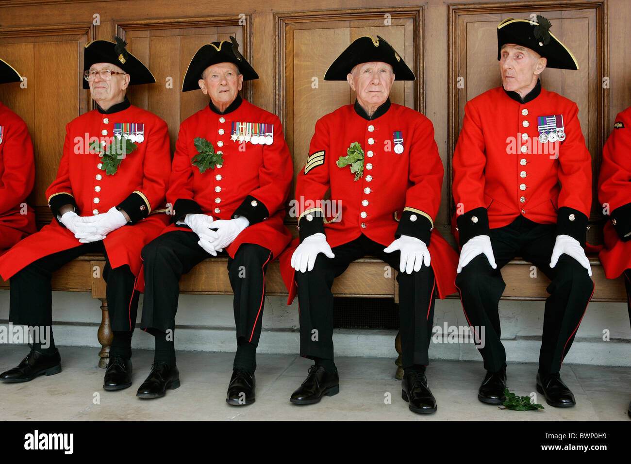 Chelsea pensionati all'annuale Festa del Fondatore Parade presso il Royal Hospital di Chelsea. Foto Stock