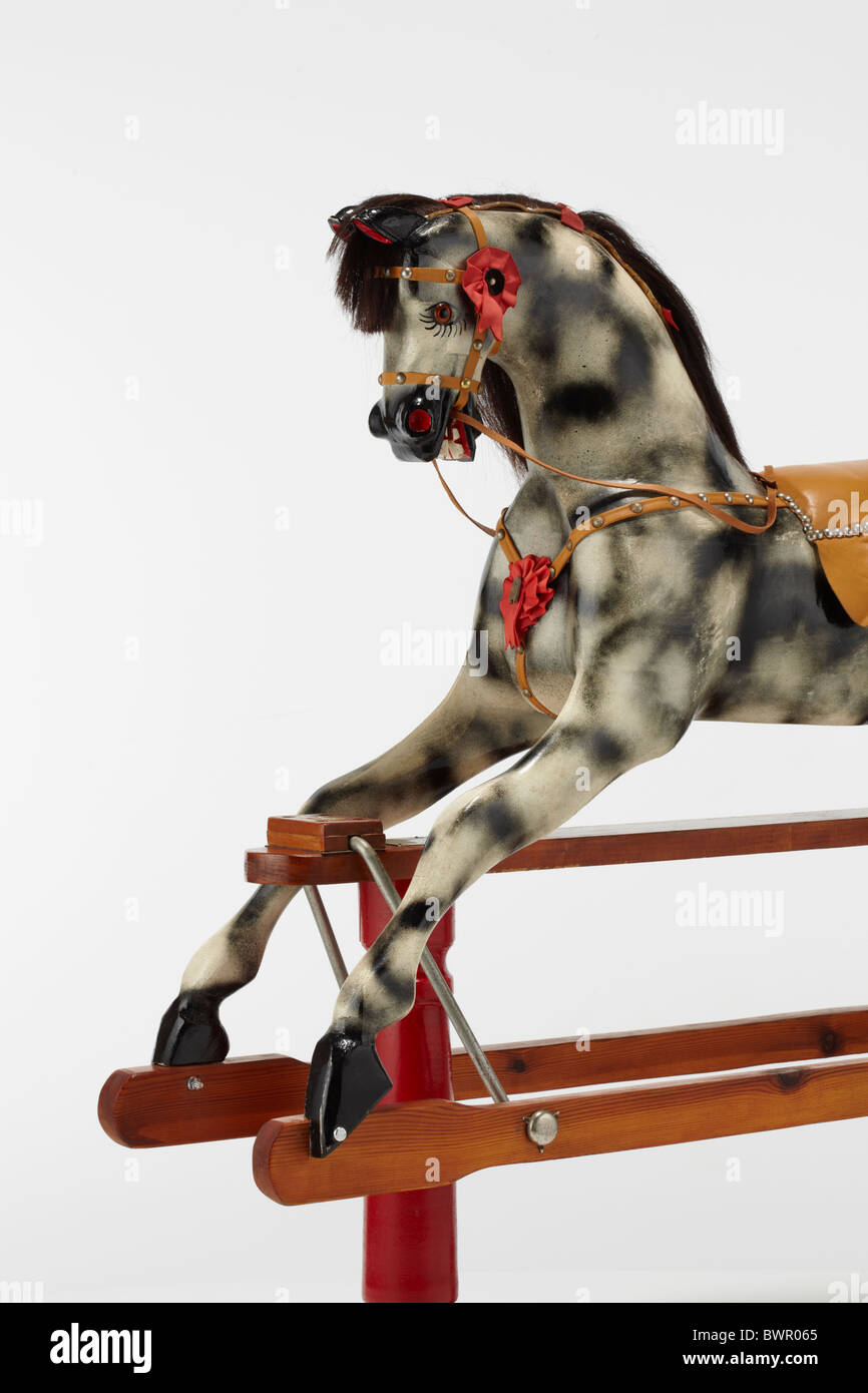 Tradizionale cavallo a dondolo su un telaio in legno Foto Stock