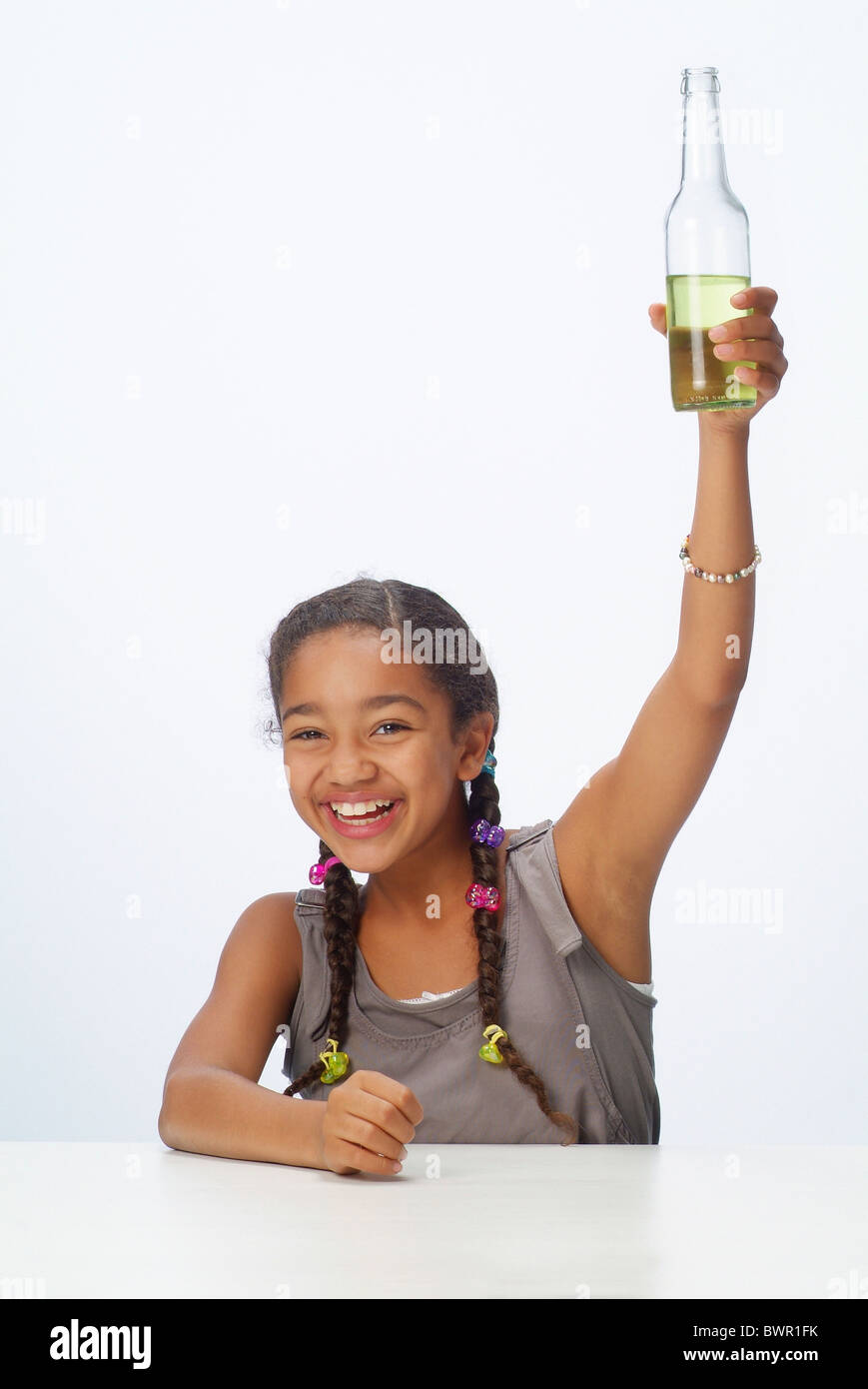 Ritratto di una ragazza con un drink Foto Stock