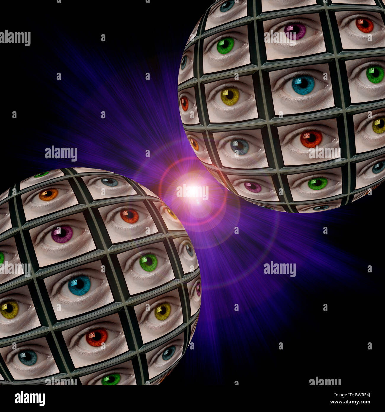 Due sfera di schermi video che mostra multi-colore occhi, in un vortice bluastro con lens flare Foto Stock