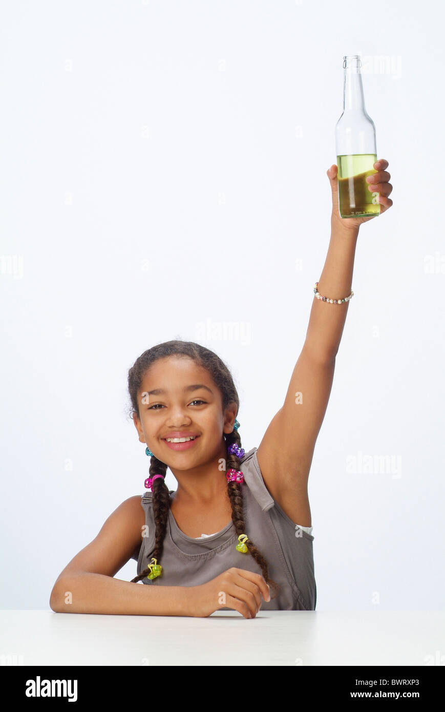 Ritratto di una ragazza con un drink Foto Stock