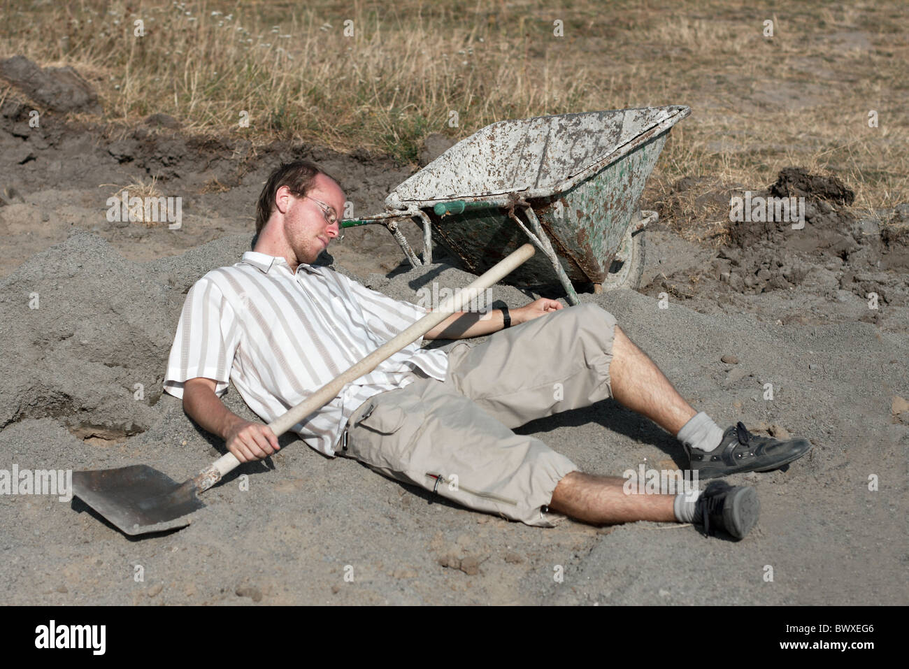 Pigro dormire invece di lavorare Foto Stock